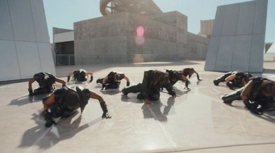 a group of people doing different poses on the ground