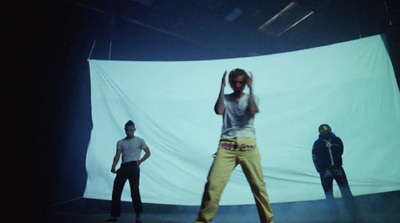 a group of people standing on top of a stage