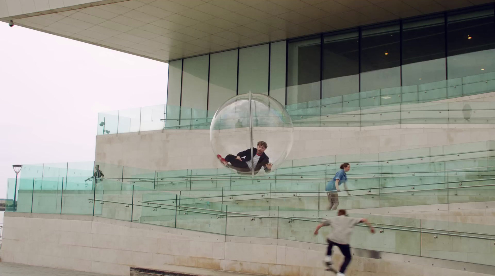 a man riding a skateboard down a set of stairs