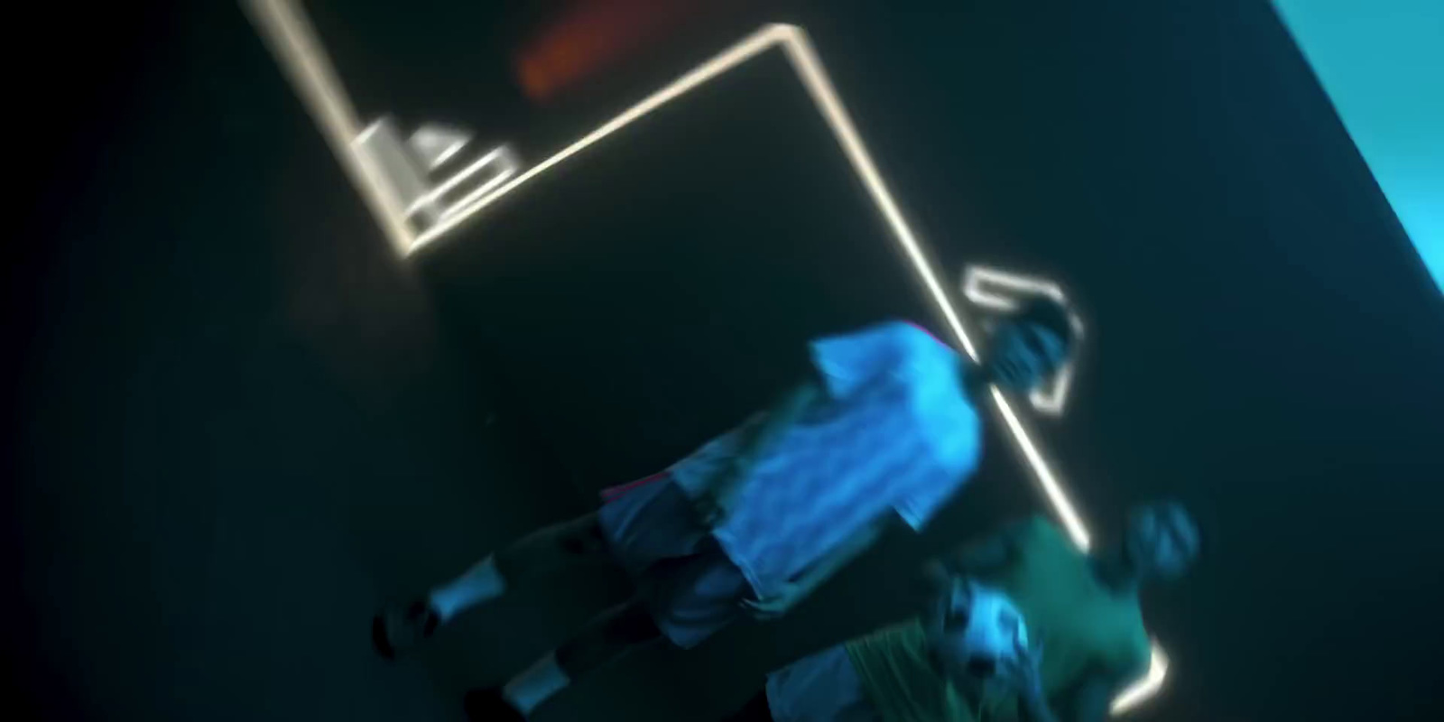 a blurry image of a person standing in a room