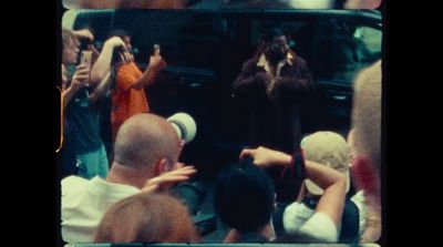 a group of people standing in front of a bus