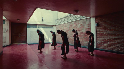 a group of people standing in a room