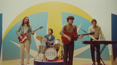 a group of people standing on top of a stage