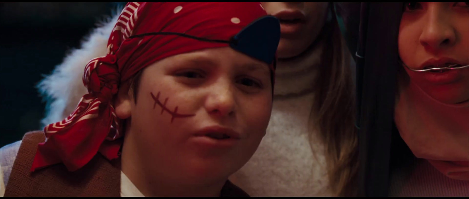 a man with a red bandana on his head