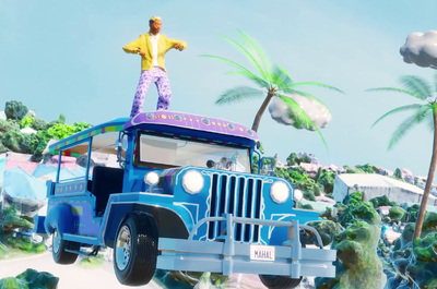 a man standing on top of a blue jeep