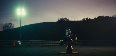 a person standing on top of a fire hydrant