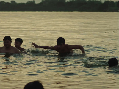 a group of people swimming in a body of water