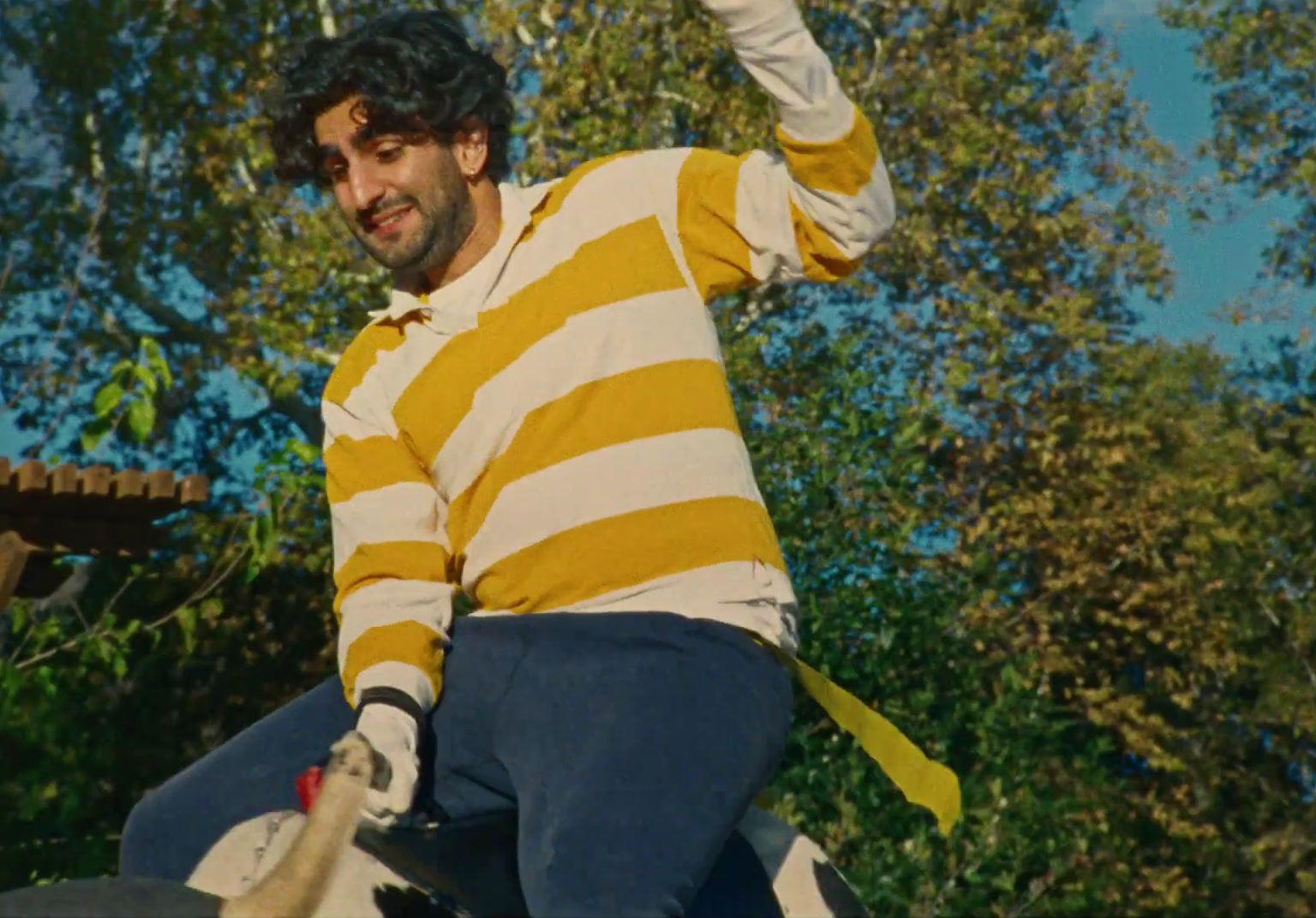 a man riding on the back of a white horse