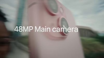 a blurry photo of a pink object with the words 48mp main camera