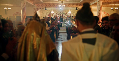 a large group of people standing in a room