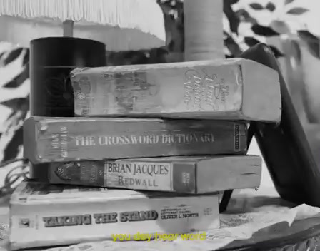 a stack of books sitting on top of a table