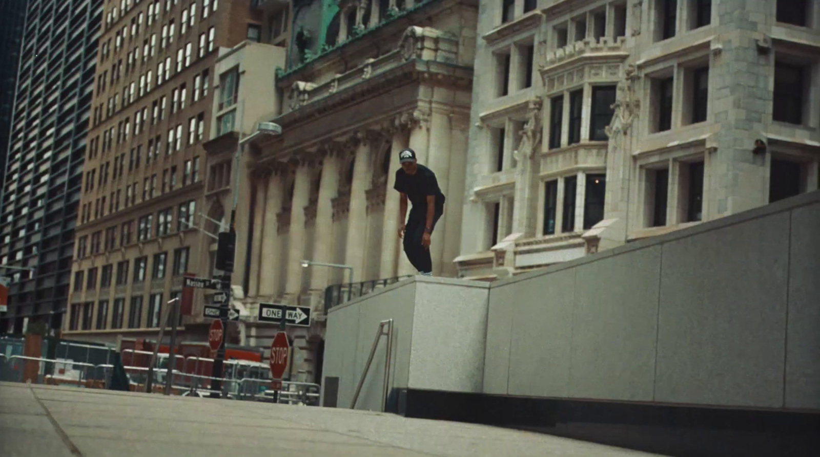 a man riding a skateboard down the side of a ramp