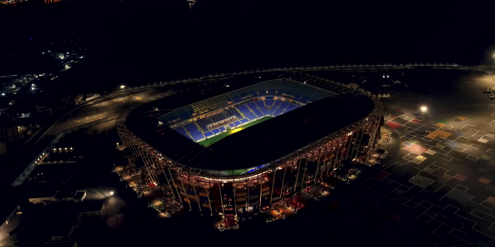 an aerial view of a stadium at night