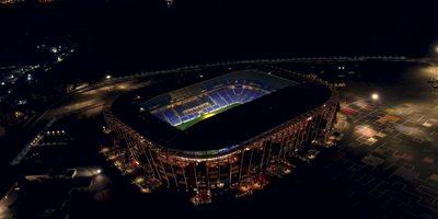 an aerial view of a stadium at night