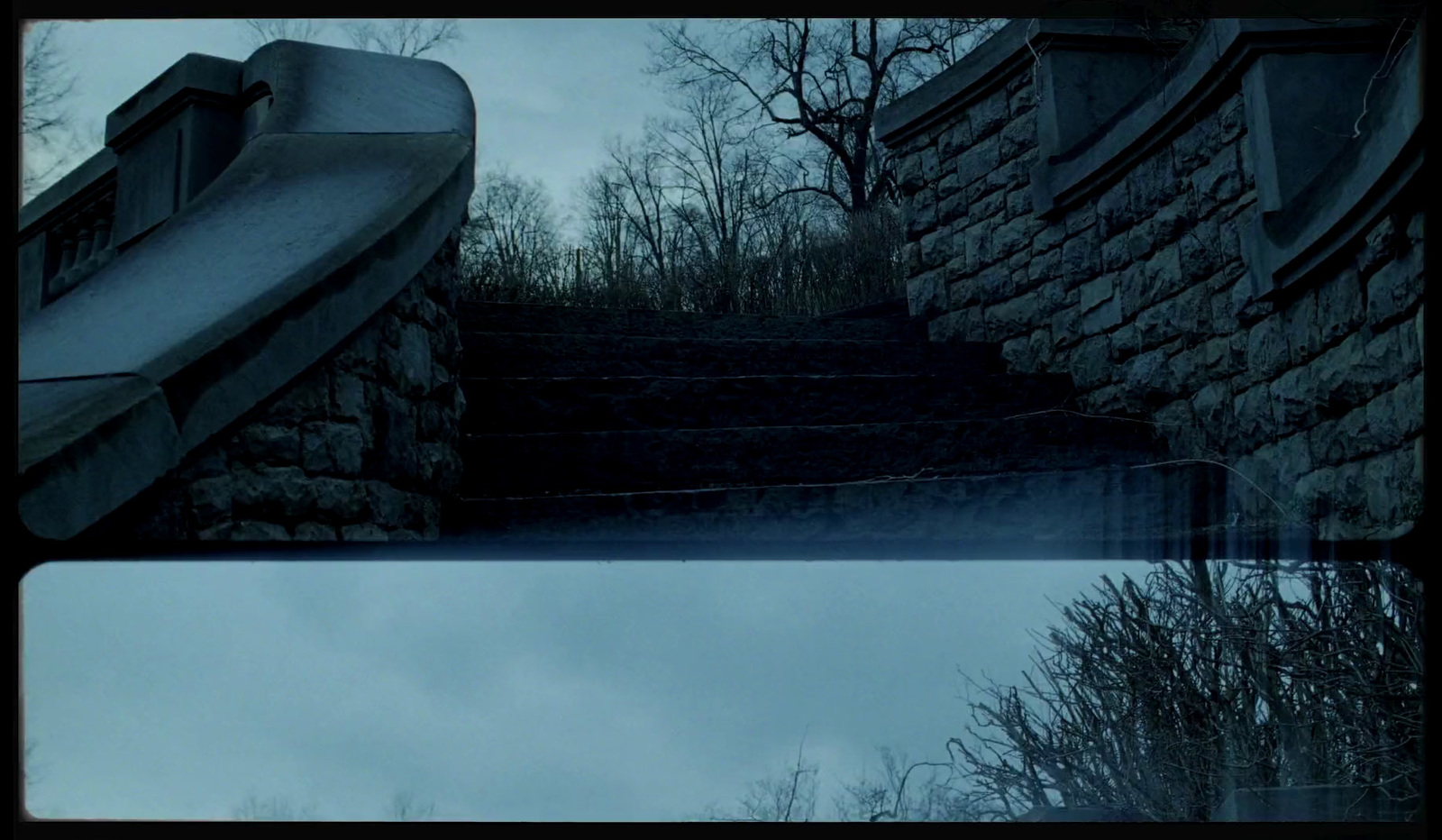 a set of stairs leading up to a stone building