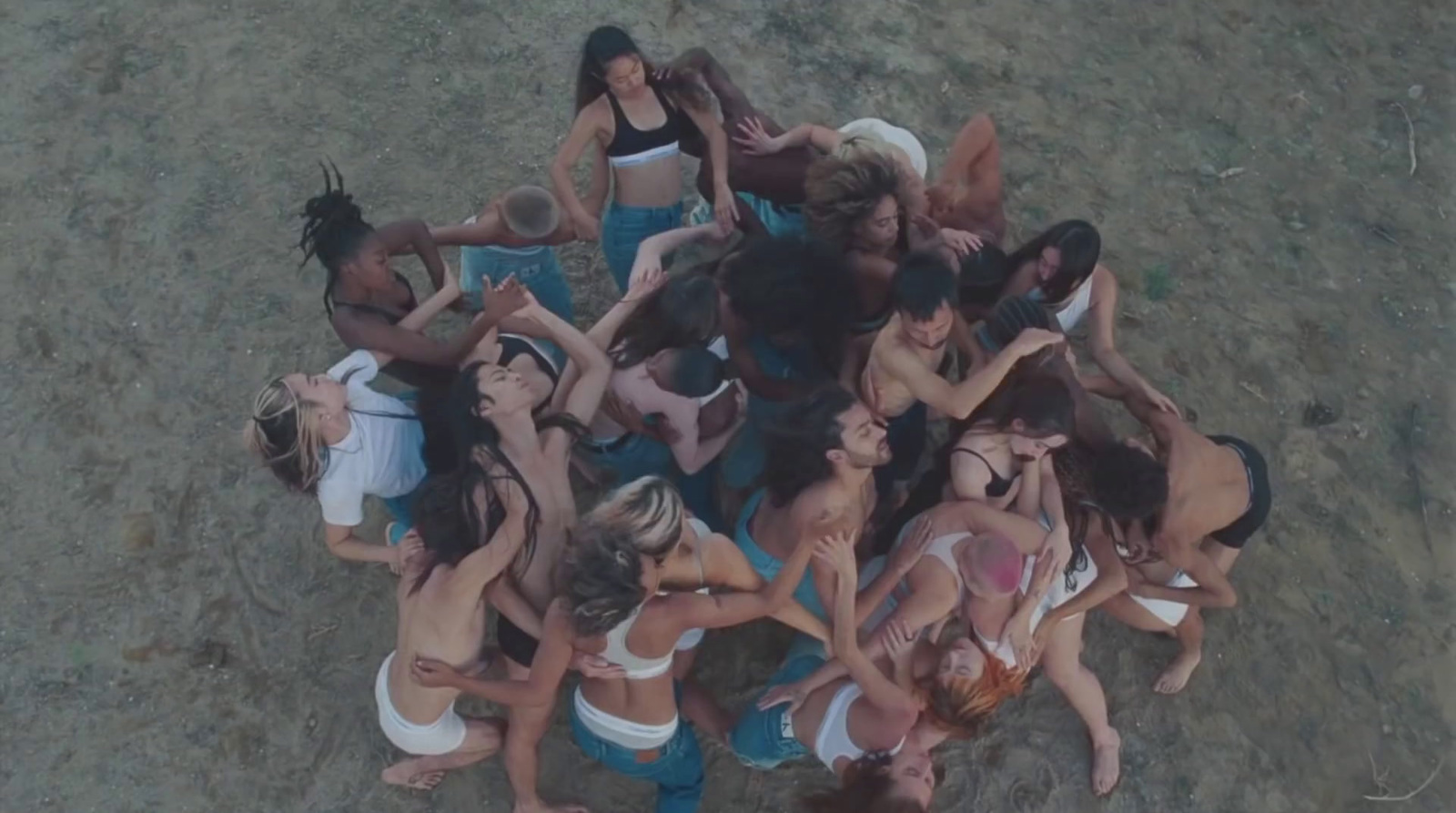 a group of women standing around each other