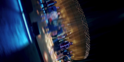 a blurry photo of a carnival ride at night