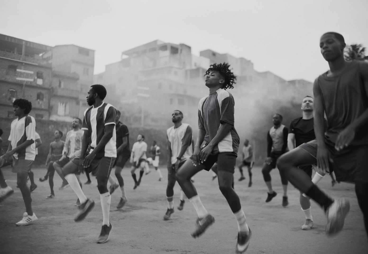 a group of young men playing a game of soccer