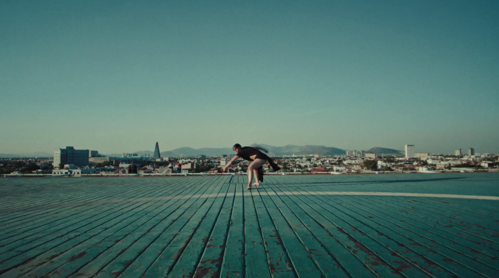 a man is doing a trick on a skateboard