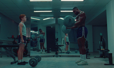 a group of men working out in a gym