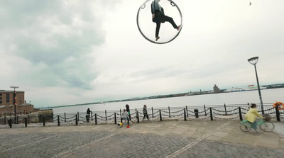 a man flying through the air while riding a bike