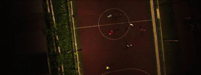 an overhead view of a basketball court at night