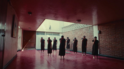 a group of people standing in a room