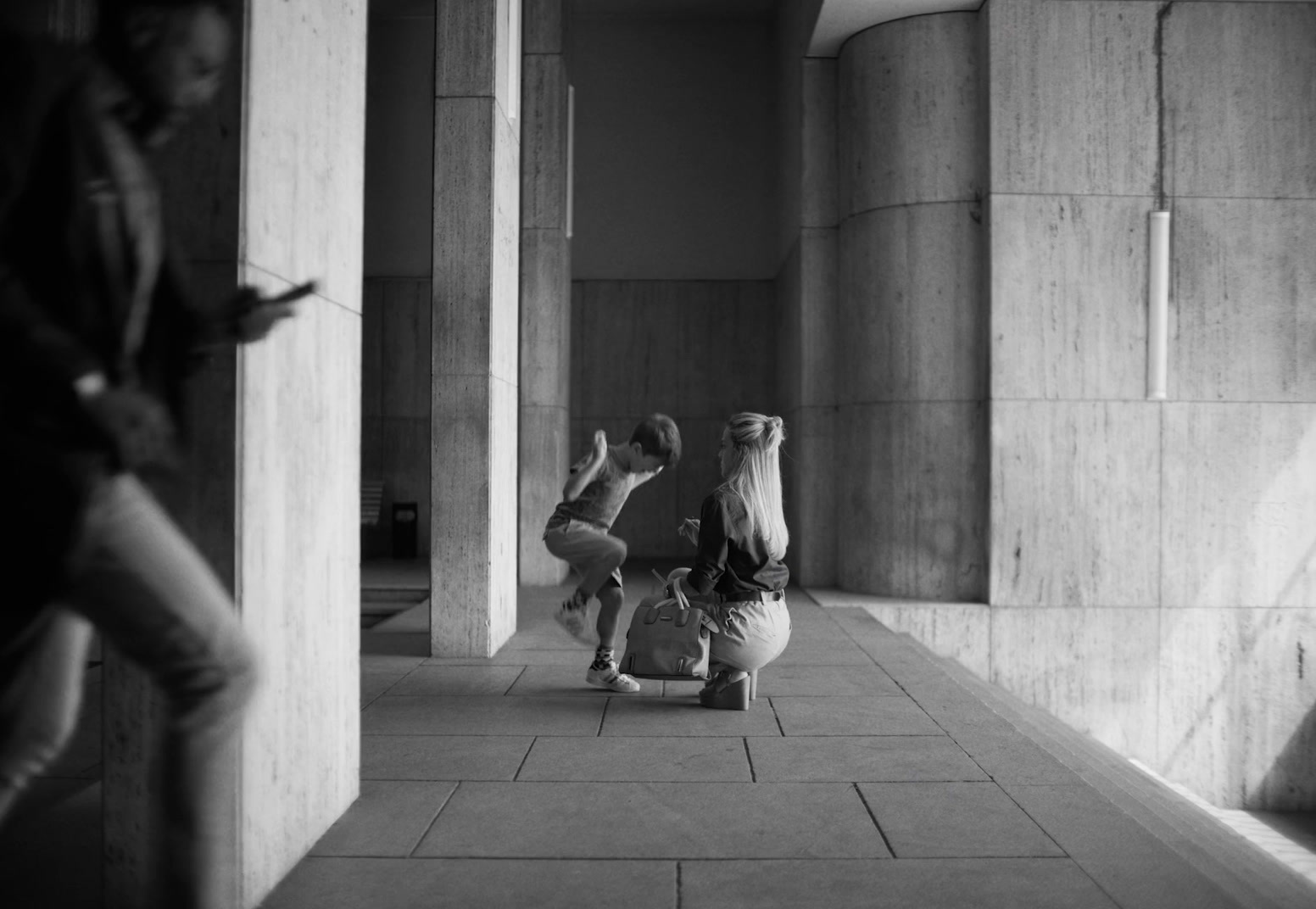 a couple of people that are standing on a skateboard