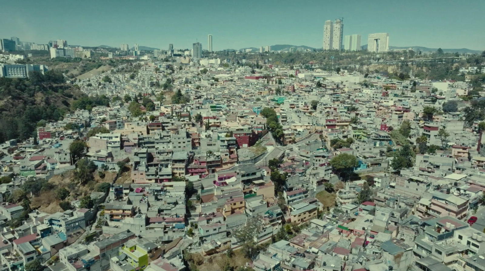 an aerial view of a city with lots of buildings