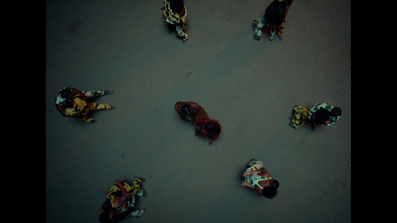 a group of dead people laying on the ground