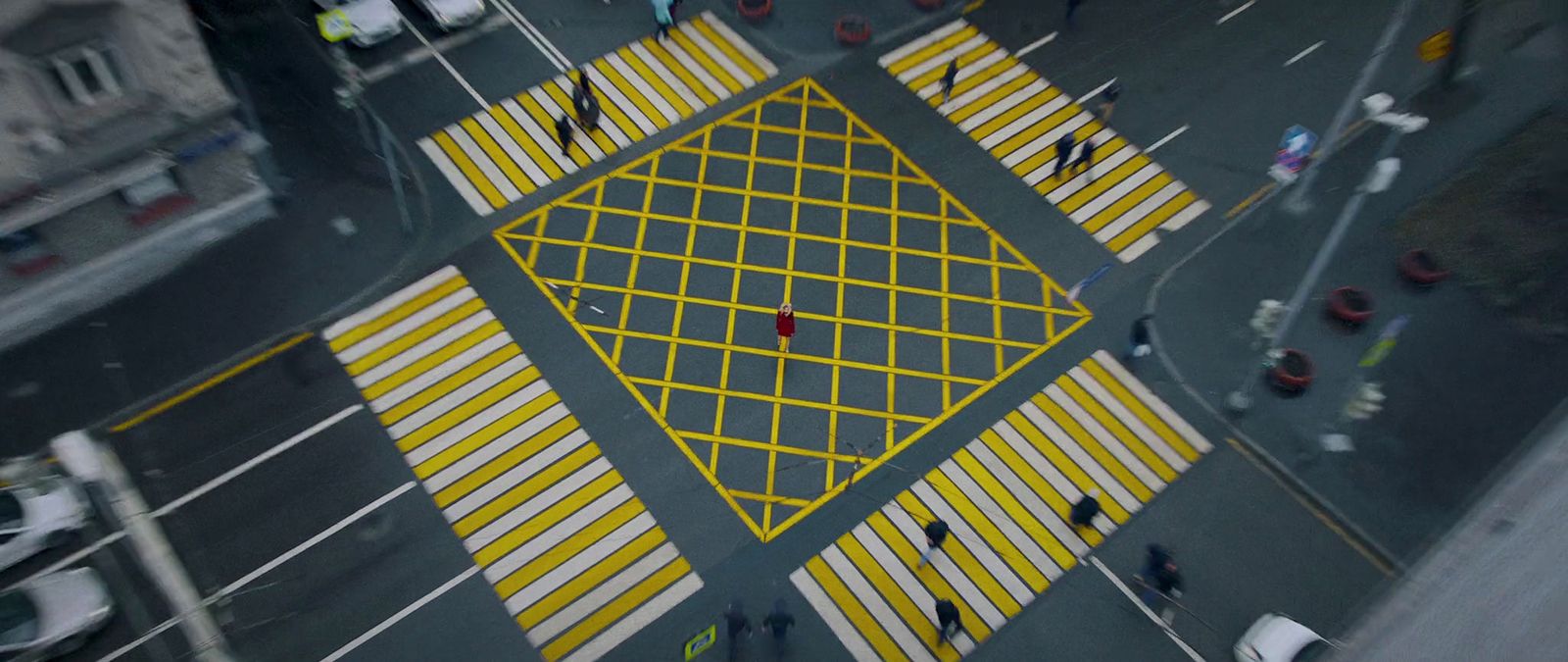 an aerial view of a crosswalk in a city