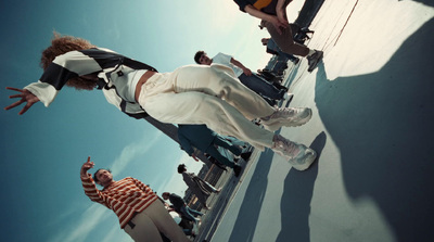 a man riding a skateboard down the side of a ramp