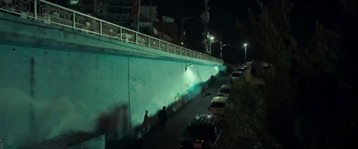 a group of cars parked on the side of a road