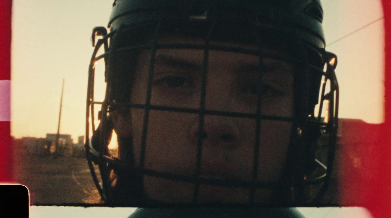 a close up of a person wearing a football helmet