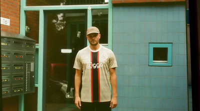 a man standing in front of a building