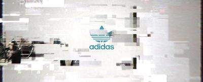 a picture of a adidas logo on a wall