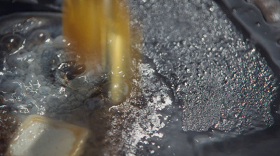 a close up of a yellow object in water