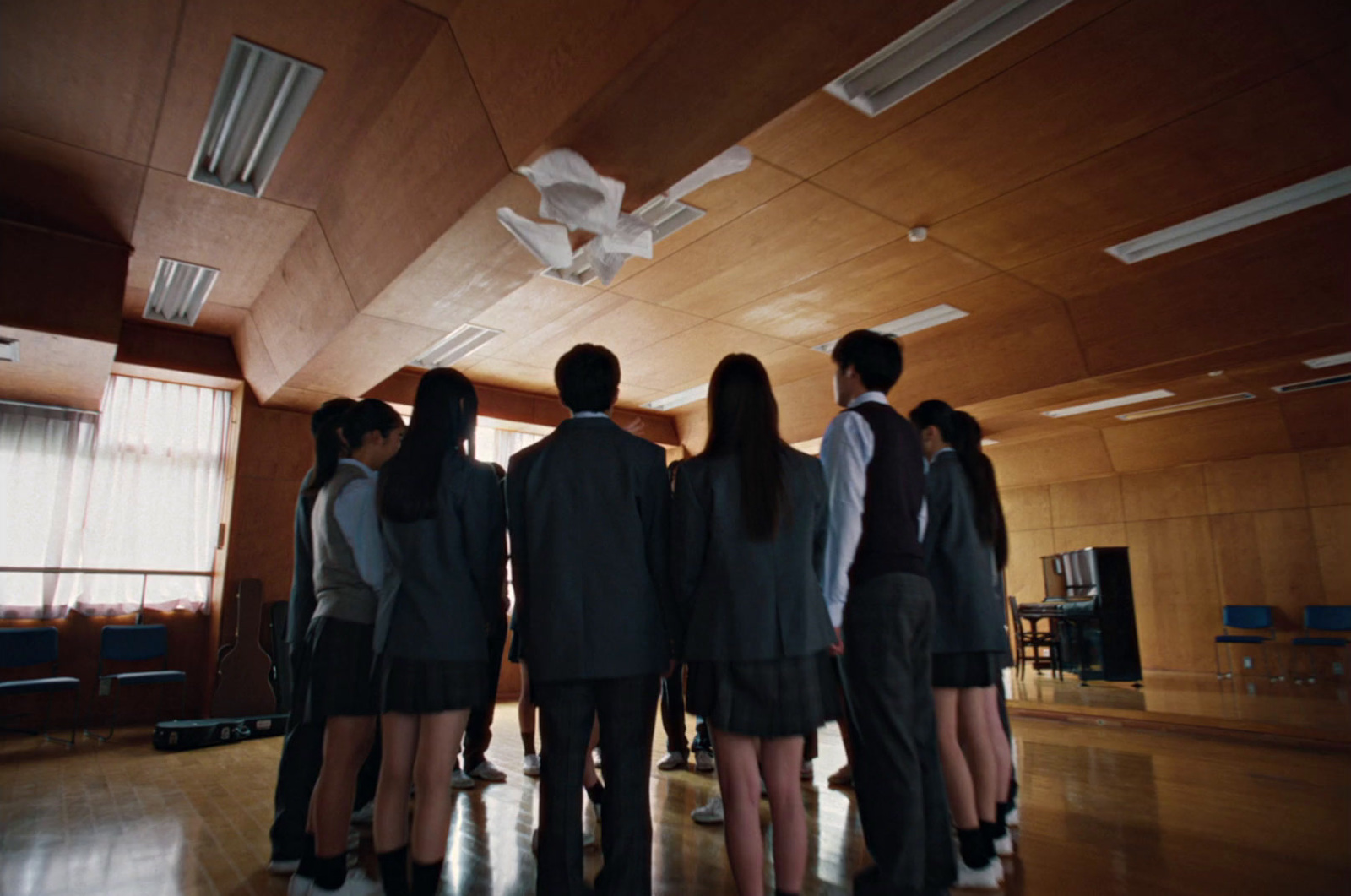 a group of people standing in a room