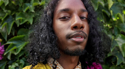 a close up of a person with long hair