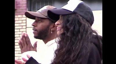 a man and a woman standing next to each other