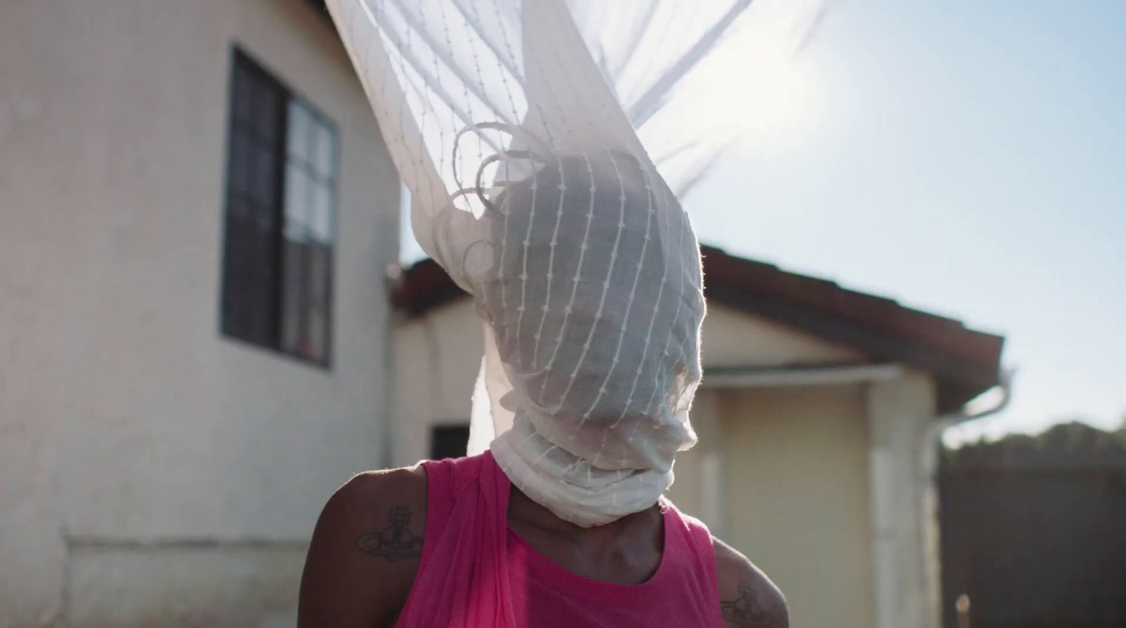 a woman with a veil over her head