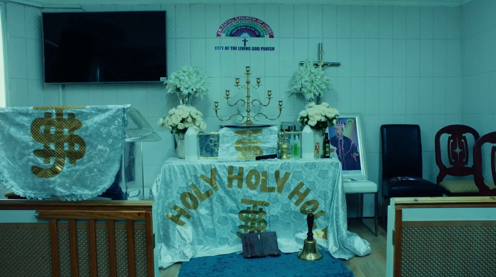 a room with a table covered in a white table cloth