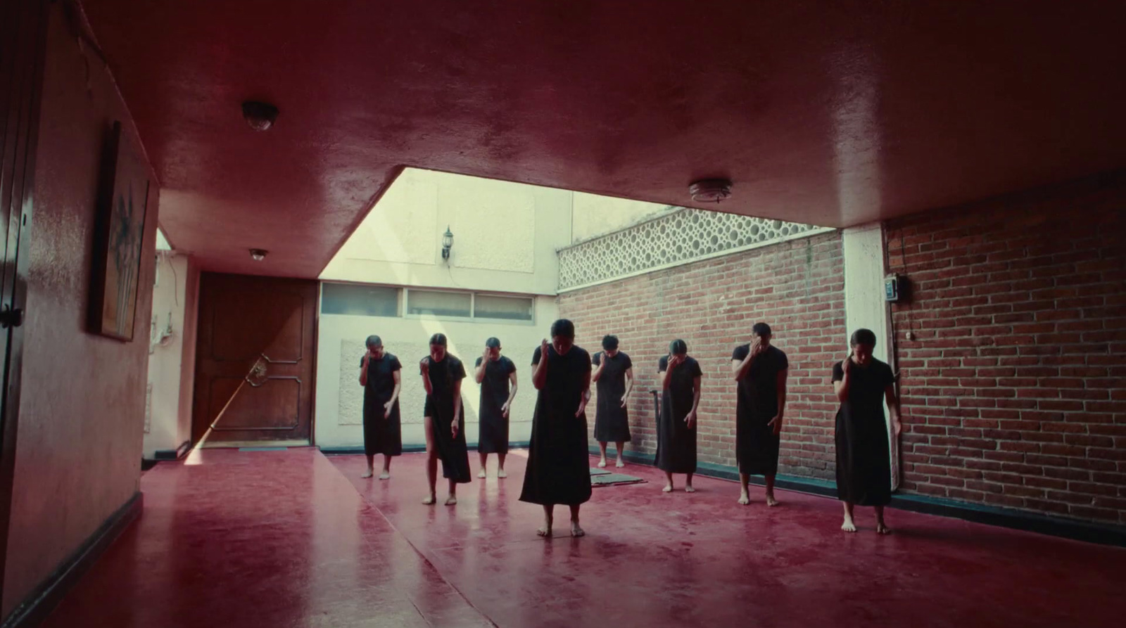 a group of mannequins standing in a room