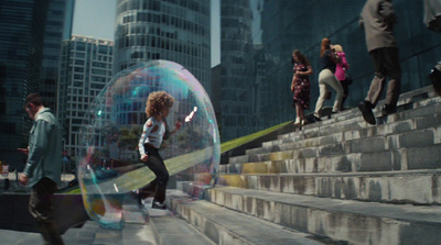 a group of people walking up a flight of stairs