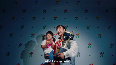 a man and a little girl holding a trophy