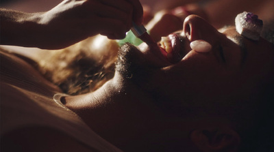 a man getting his teeth checked by a dentist