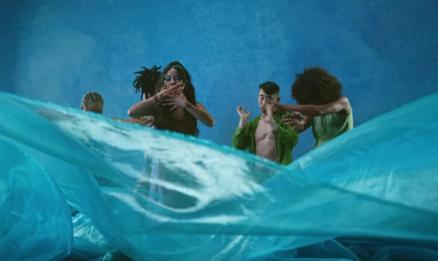 a group of people standing in a pool of water