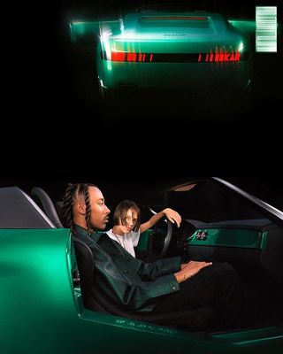 a man and a woman sitting in a green sports car