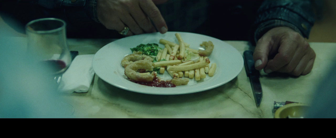 a white plate topped with fries and vegetables