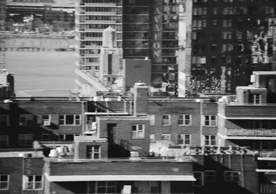 a black and white photo of buildings in a city